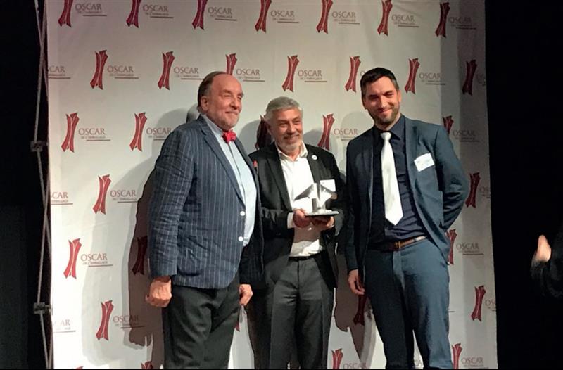 Photo of Jean-Marc Dahan and Frédéric Soulier of MGI Digital Technology receiving the 2019 Packaging Oscar